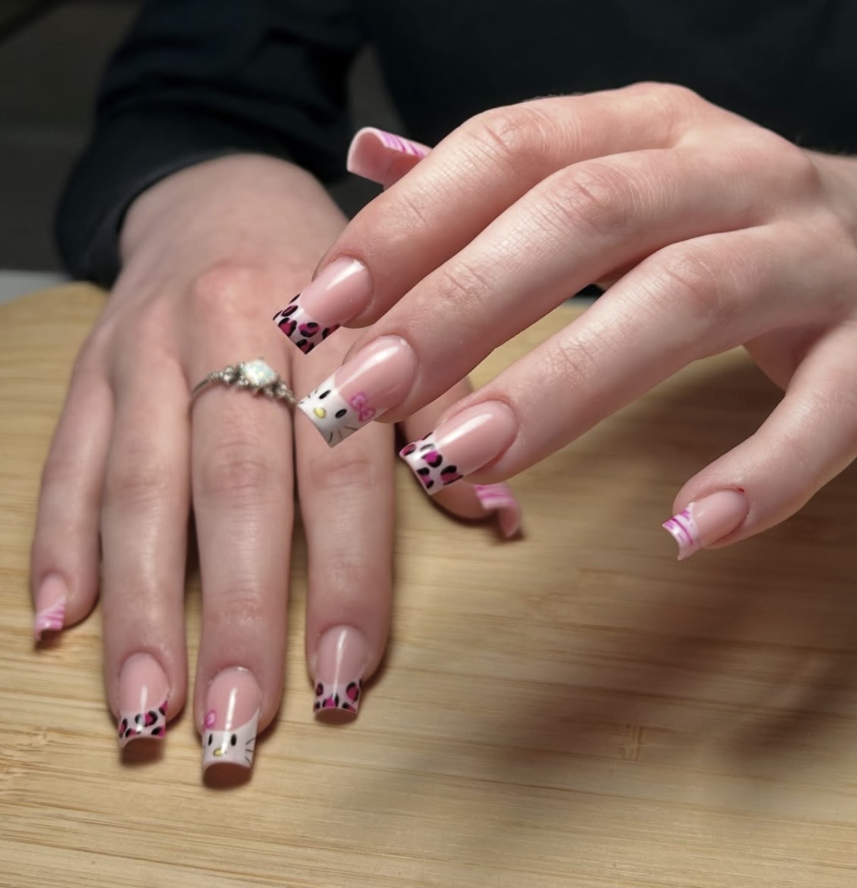 Pink leopard print French tips with hand painted character art